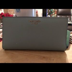 Kate Spade light blue slim bifold wallet